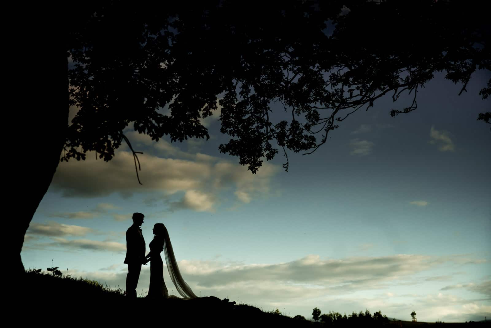 Stunning silhouette of a bride and groom at dodford manor